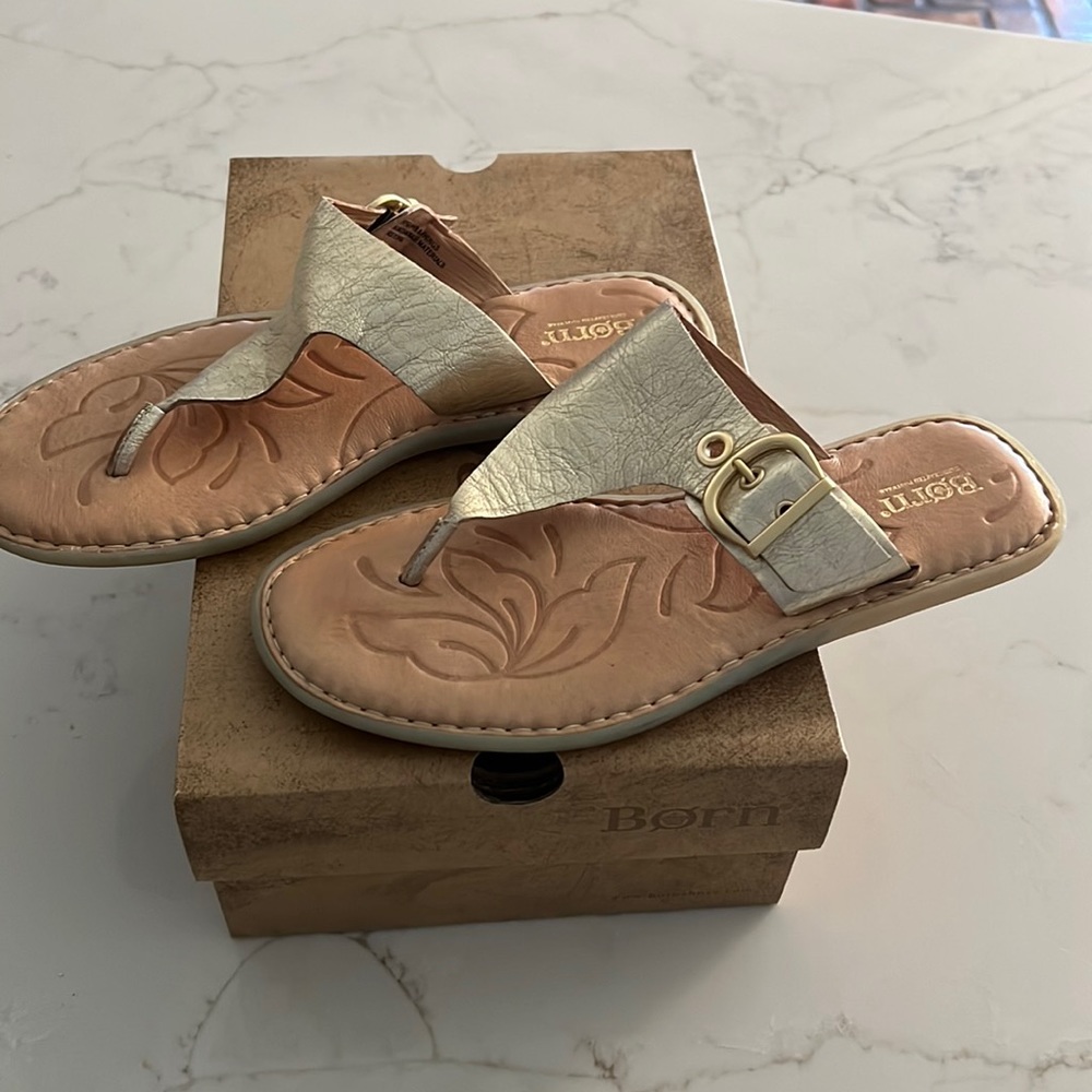 Born, metallic gold sandals perfect for the beach!